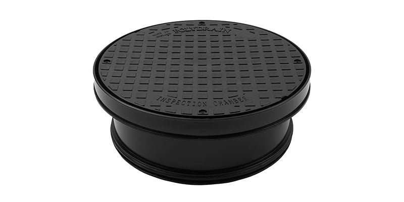 Black manhole cover on a white background