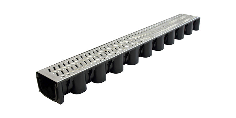 Drainage channel with galvanised slotted grate on a white background
