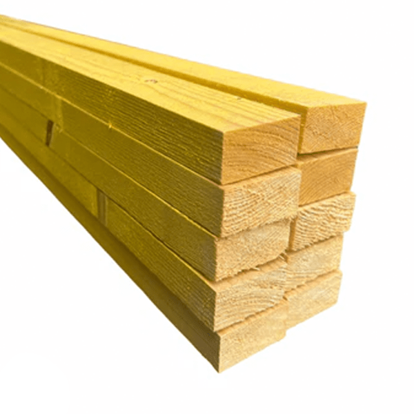 A bundle of yellow treated timber battens, tied together, with a visible wood grain and green tint.