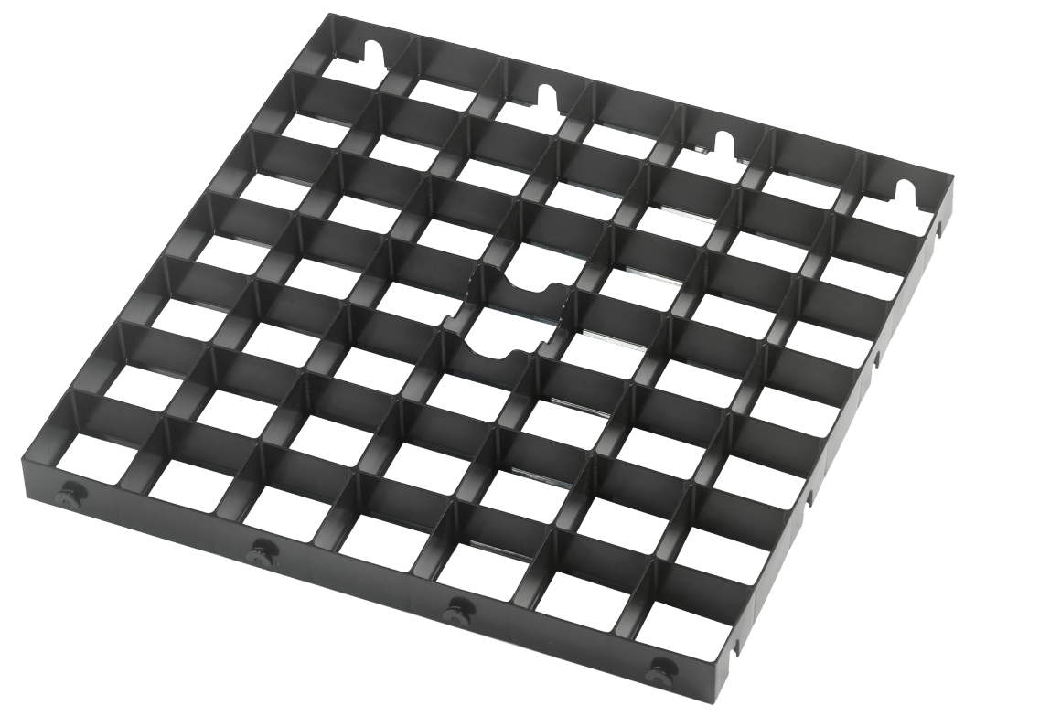 Black plastic grid tray on a white background