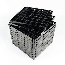 Stack of black plastic gravel grid on a white background